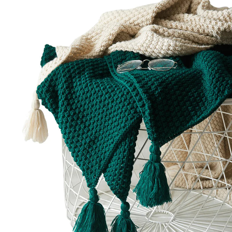 Plaid tricoté en laine avec franges