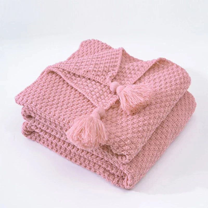 Plaid tricoté en laine avec franges