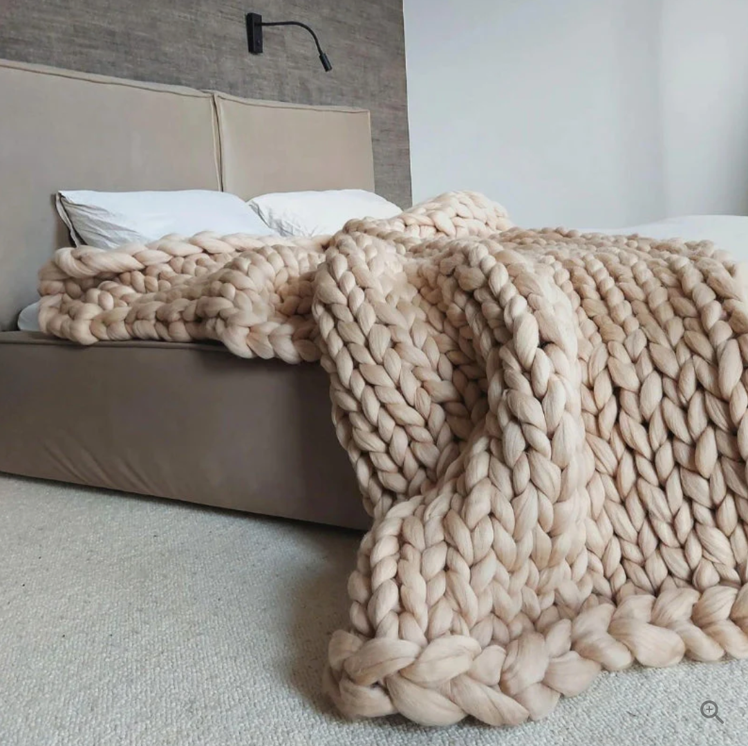 Plaid tricoté en laine mérinos – chaleur et luxe