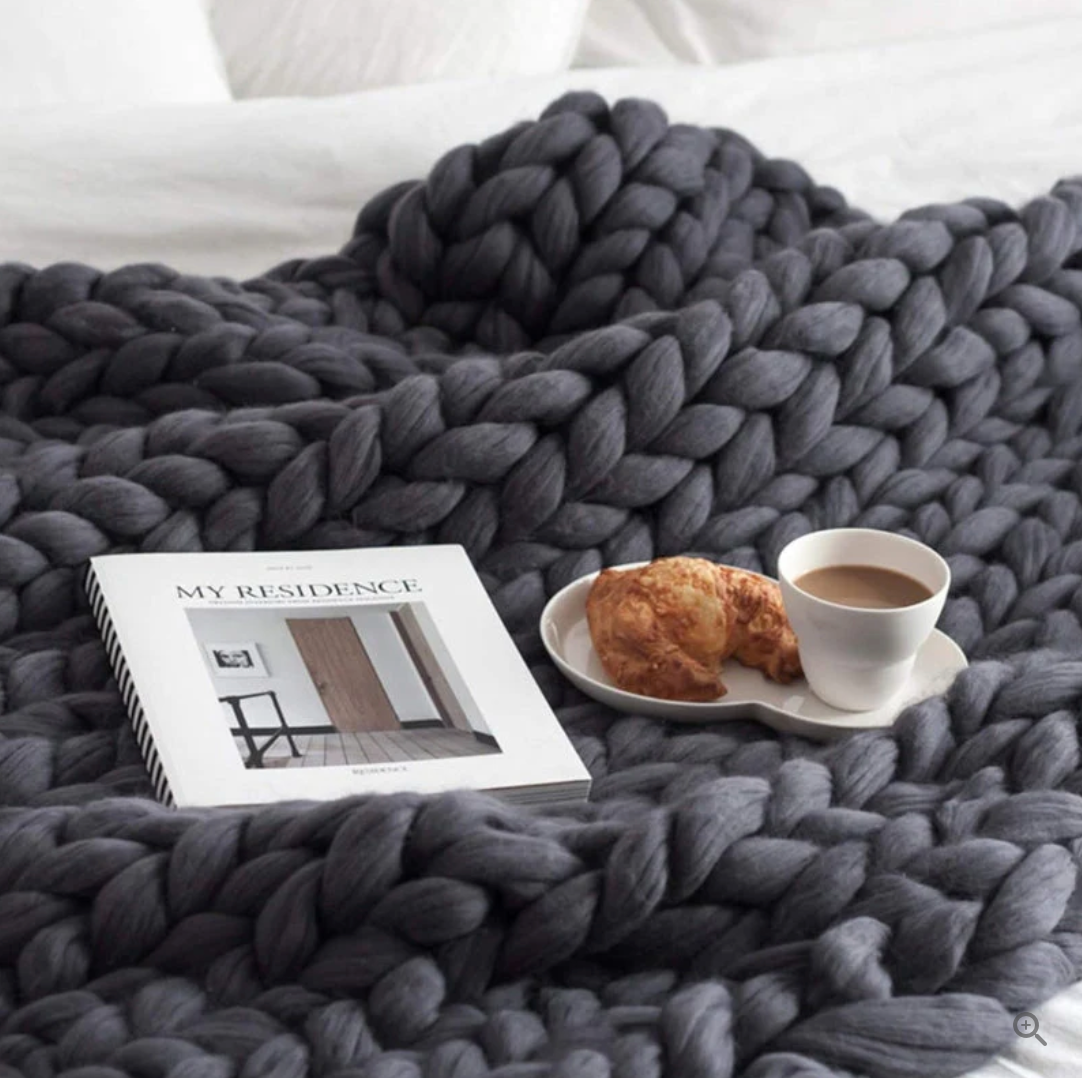 Plaid tricoté en laine mérinos – chaleur et luxe