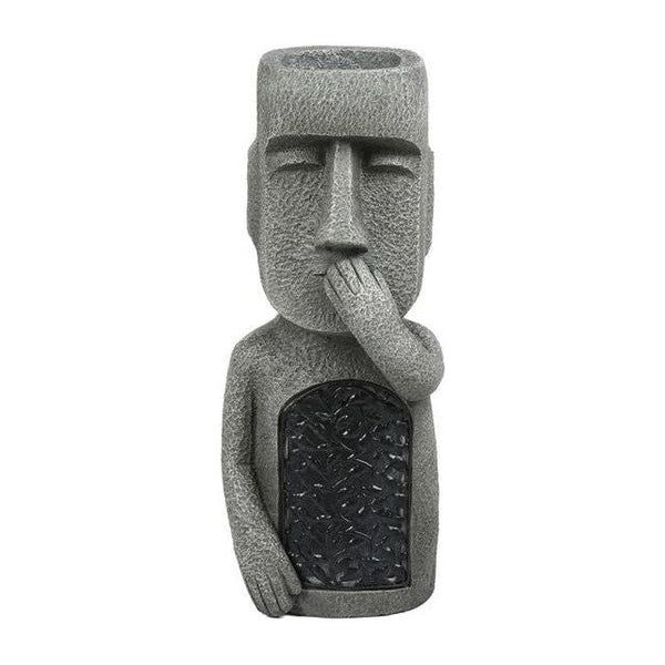 Pot à fleurs avec visage sculpté