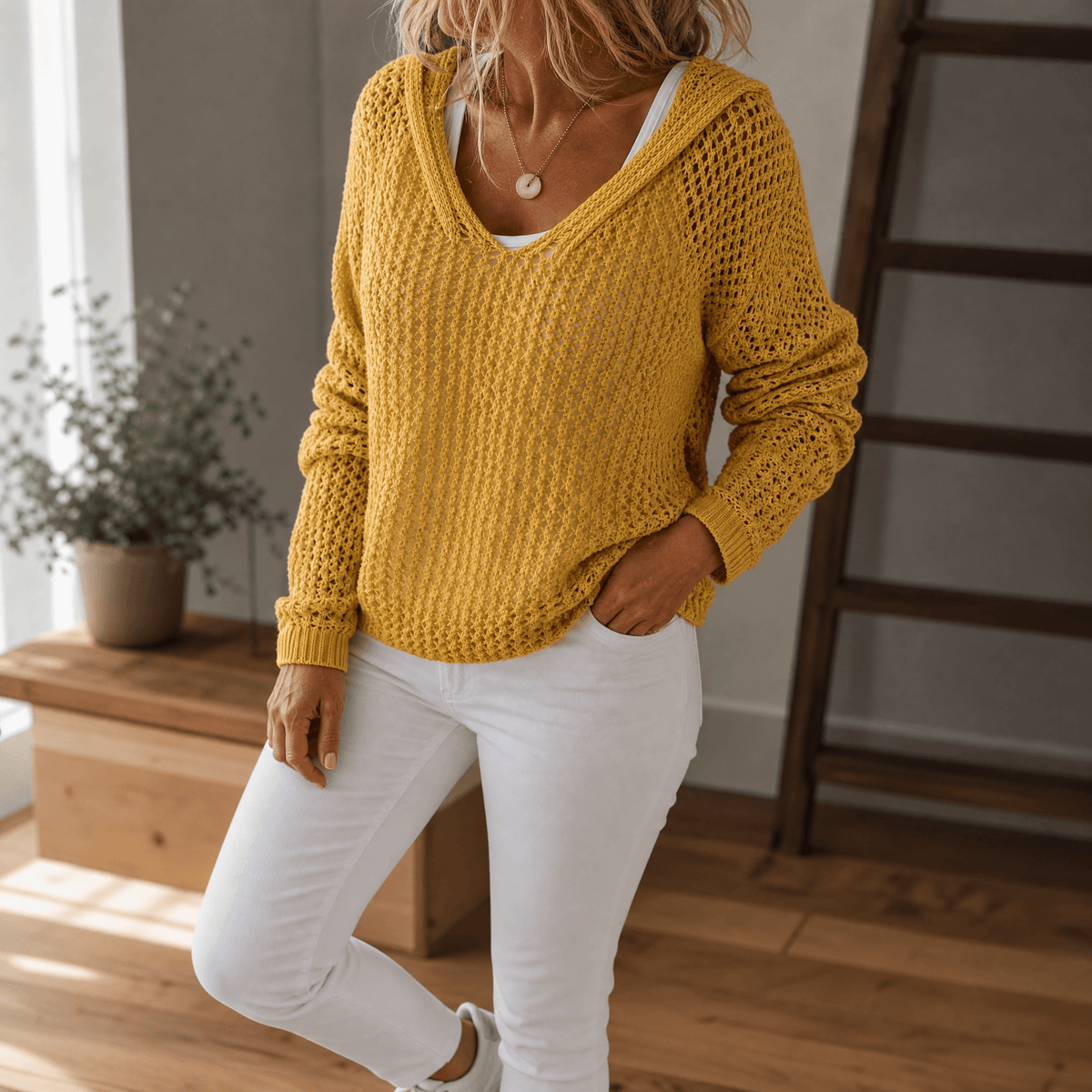 Pull à capuche en maille ajourée pour femme