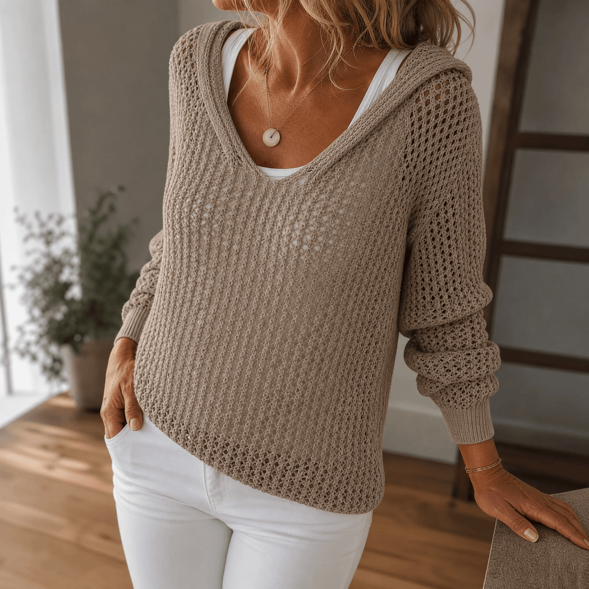 Pull à capuche en maille ajourée pour femme