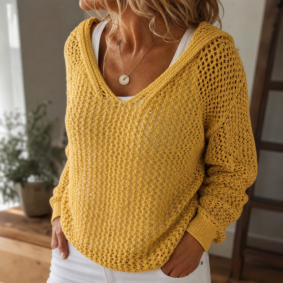 Pull à capuche en maille ajourée pour femme