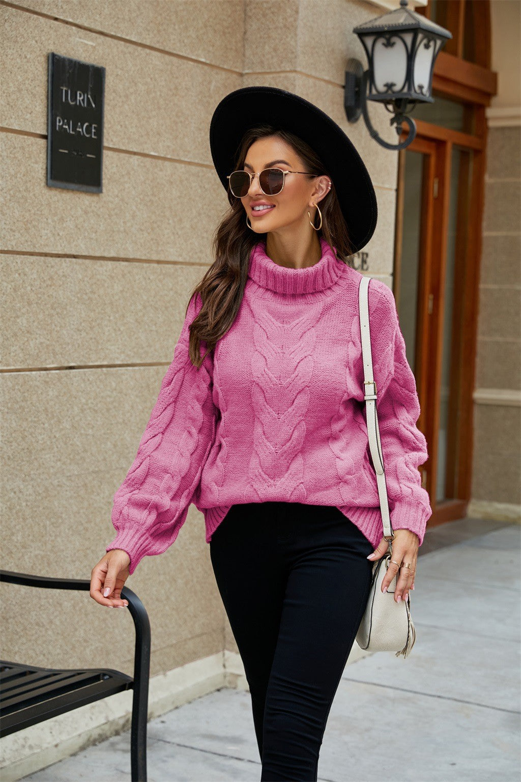 Pull à col roulé en tricot à torsades pour femme