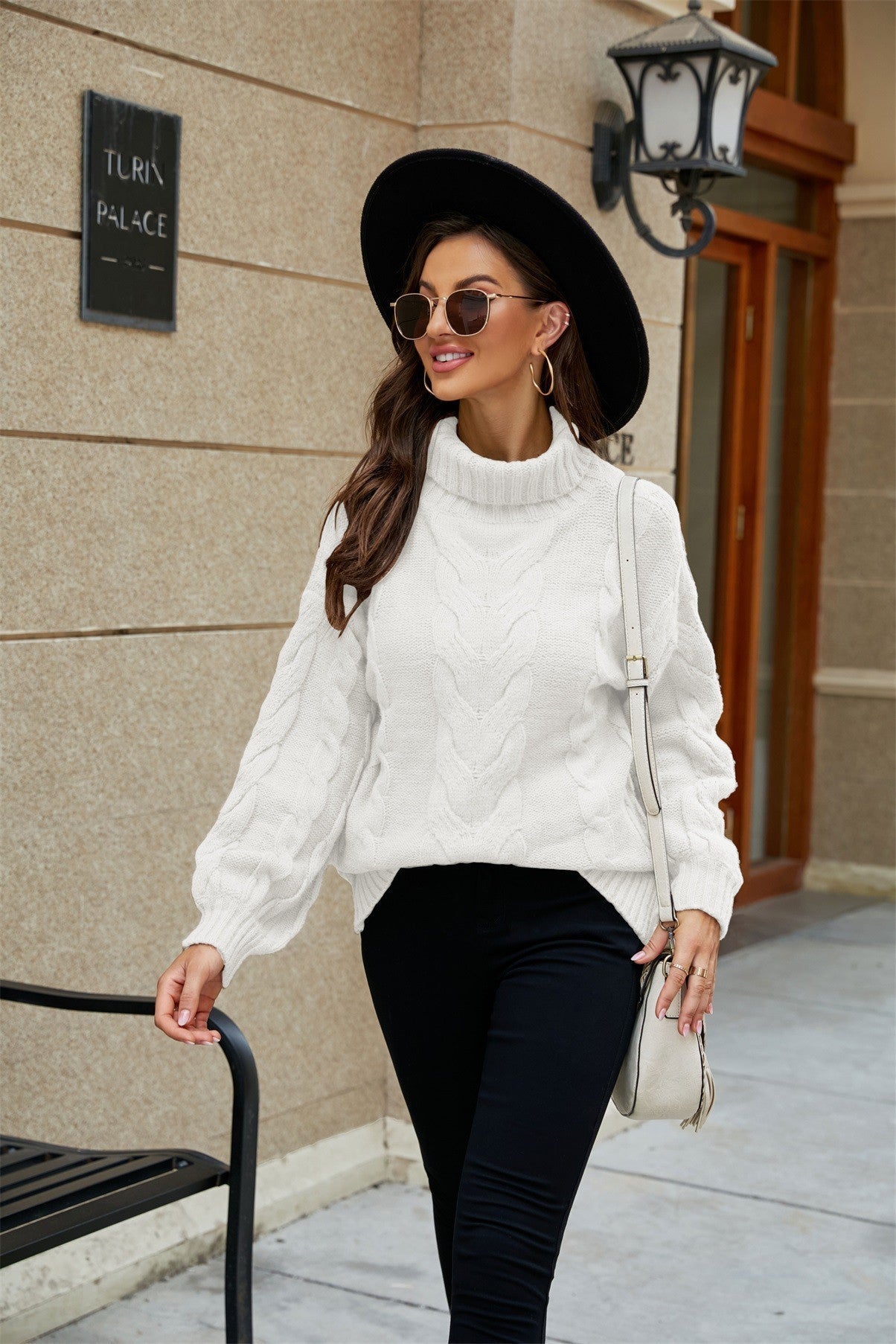 Pull à col roulé en tricot à torsades pour femme
