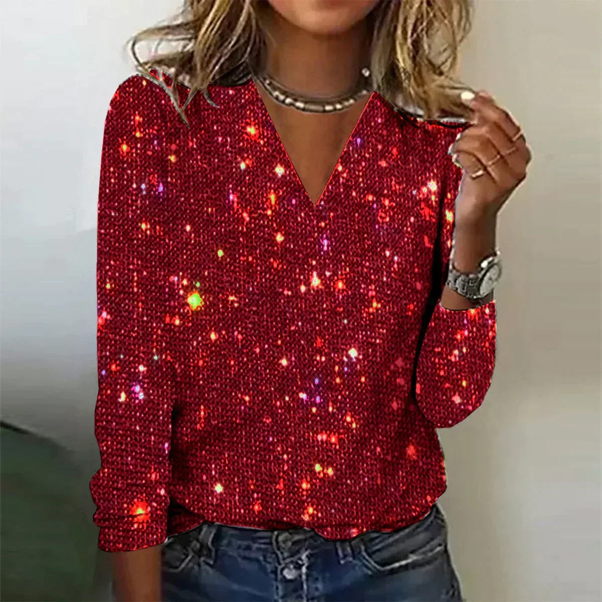 Pull brillant à col en V et paillettes