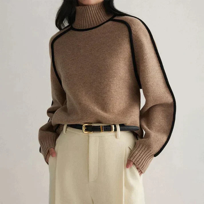 Pull col roulé élégant en cachemire pour femme avec subtils détails contrastants