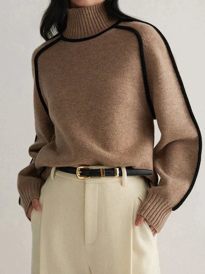 Pull col roulé élégant en cachemire pour femme avec subtils détails contrastants