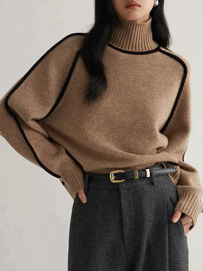 Pull col roulé élégant en cachemire pour femme avec subtils détails contrastants