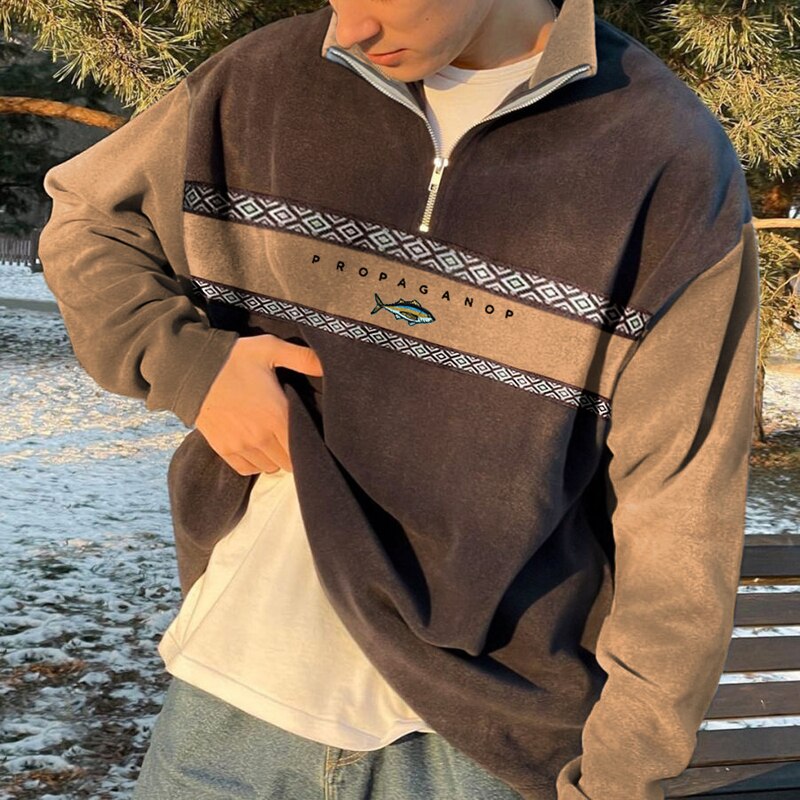 Pull moderne à col montant et demi-zip