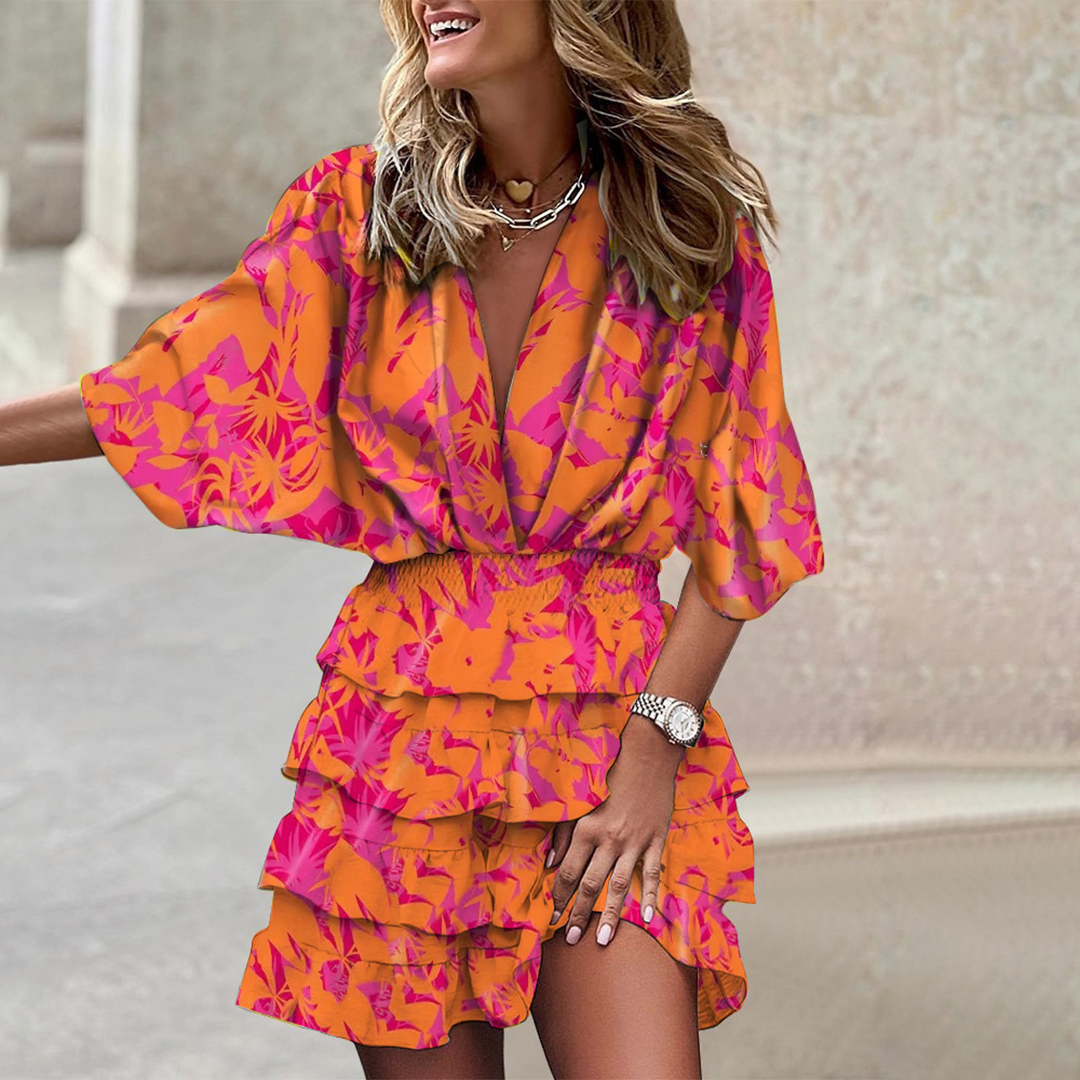 Robe courte à col en V et motif géométrique