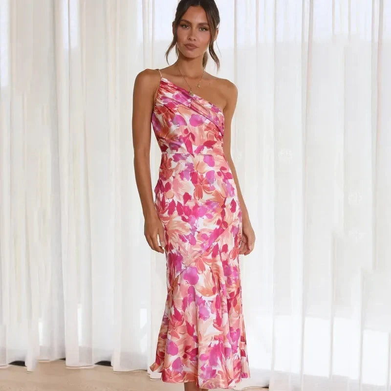 Robe midi élégante à motif floral et coupe asymétrique pour toutes les occasions