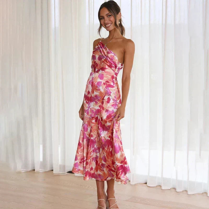 Robe midi élégante à motif floral et coupe asymétrique pour toutes les occasions