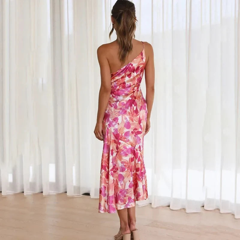 Robe midi élégante à motif floral et coupe asymétrique pour toutes les occasions