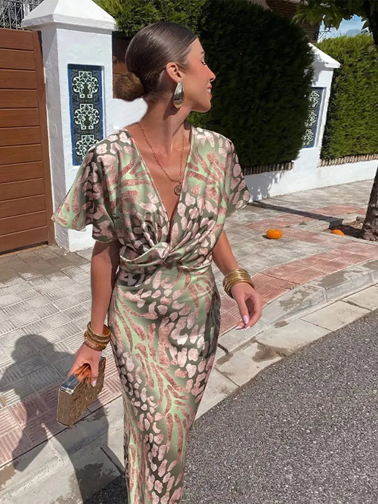 Robe midi élégante pour femme avec col en V et détail noué