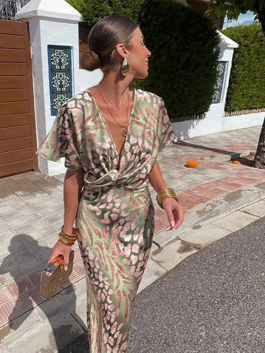Robe midi élégante pour femme avec col en V et détail noué