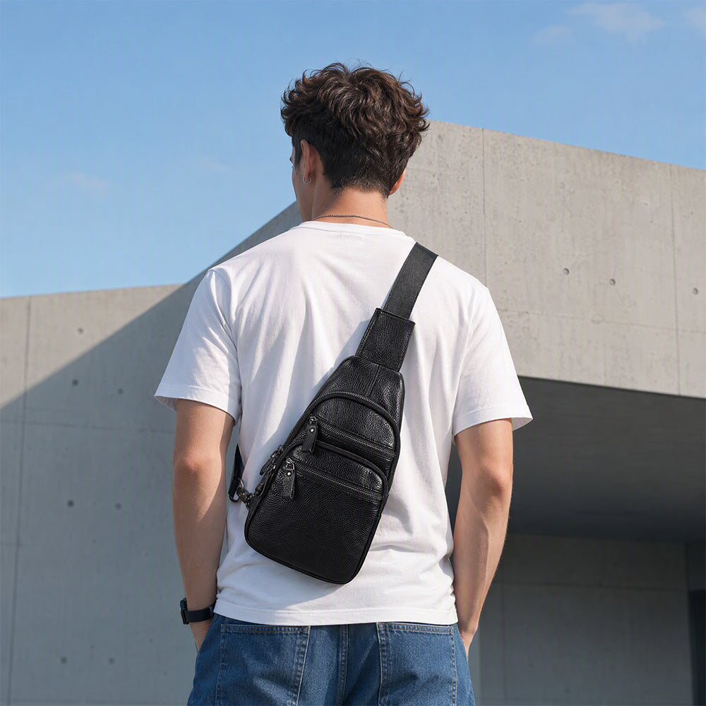 Sac bandoulière en cuir avec multiples poches zippées et sangle réglable