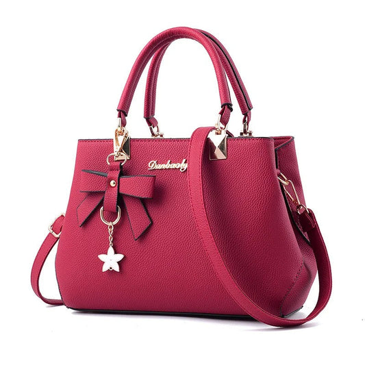 Sac bandoulière pour femme avec pendentif fleur