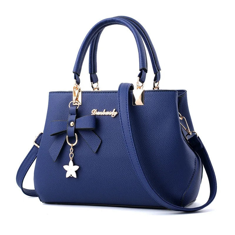 Sac bandoulière pour femme avec pendentif fleur