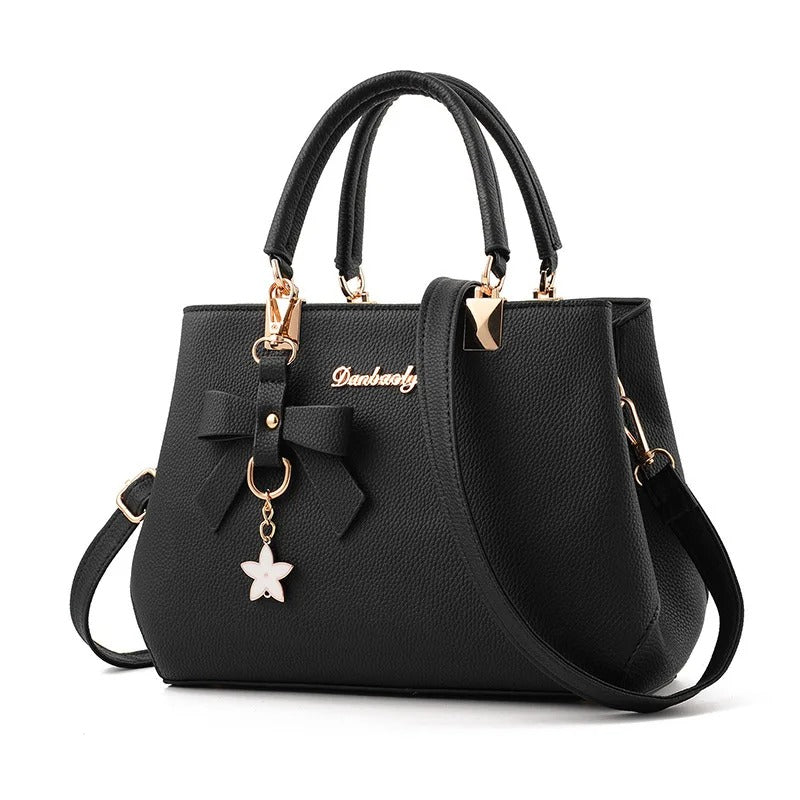 Sac bandoulière pour femme avec pendentif fleur