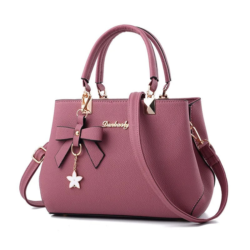 Sac bandoulière pour femme avec pendentif fleur