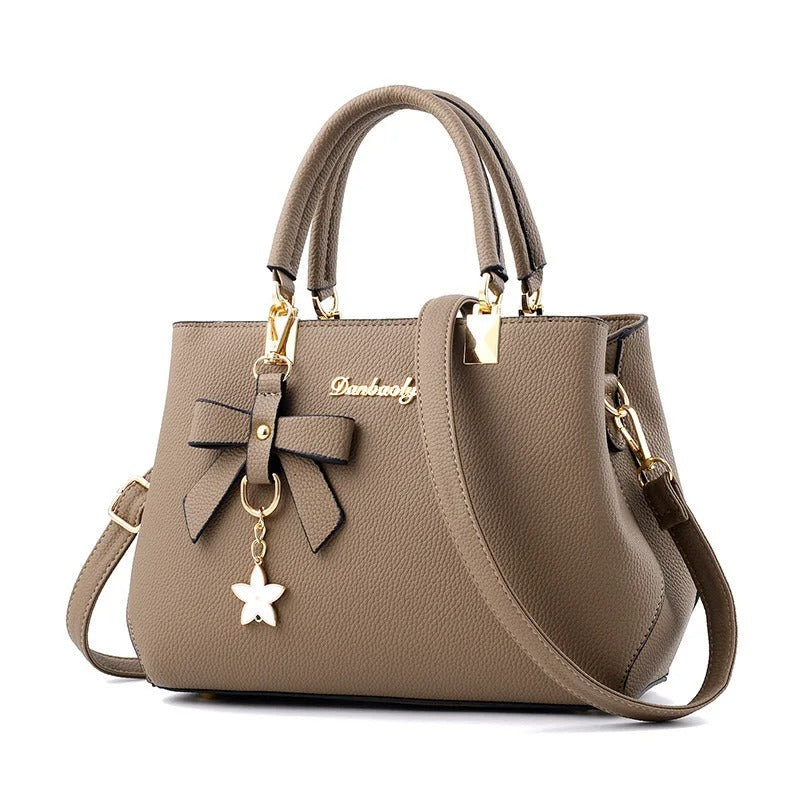 Sac bandoulière pour femme avec pendentif fleur