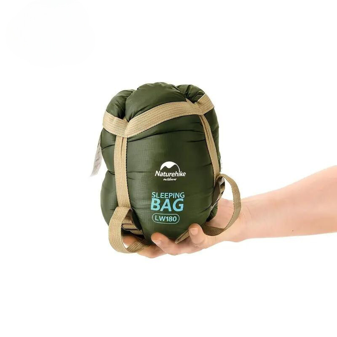 Sac de couchage compact vert, léger et chaud