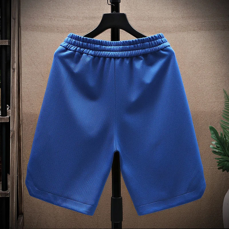 Short cargo homme coupe ample avec panneaux contrastants et cordon de serrage à la taille