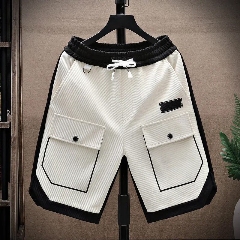 Short cargo homme coupe ample avec panneaux contrastants et cordon de serrage à la taille