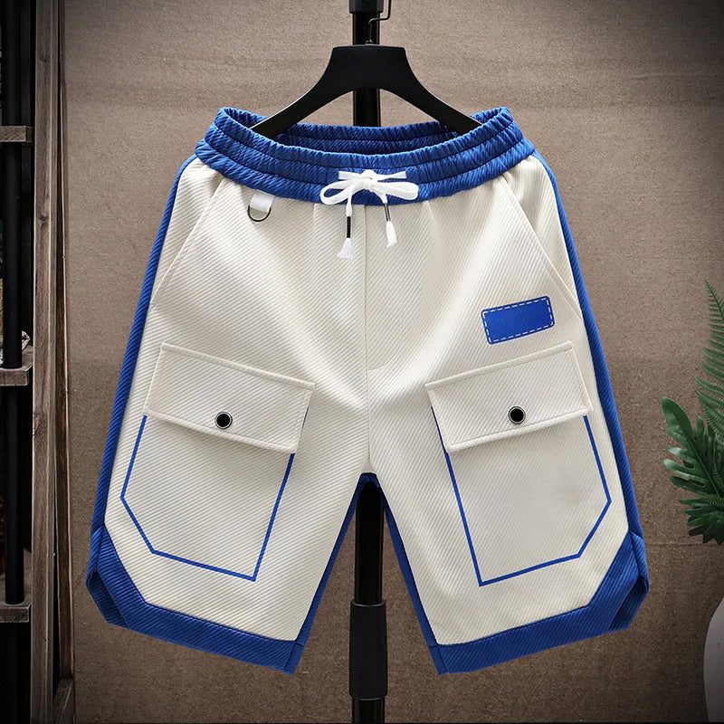 Short cargo homme coupe ample avec panneaux contrastants et cordon de serrage à la taille