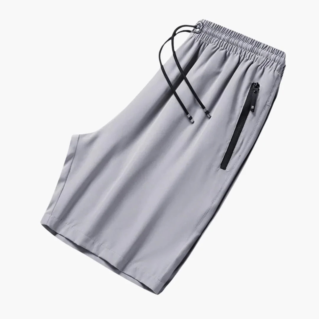 Short de sport homme avec poches zippées et cordon de serrage à la taille