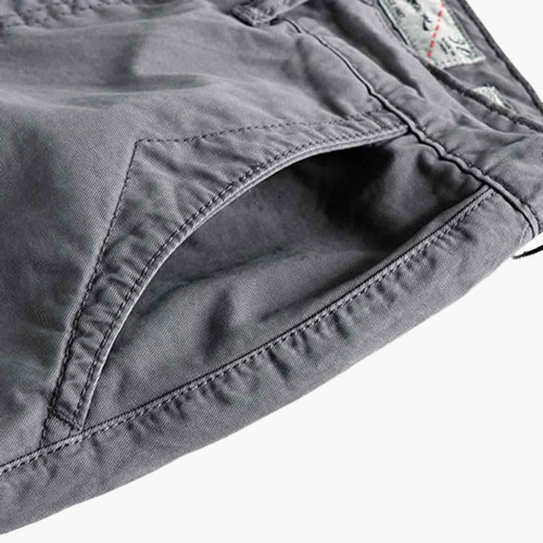 Short homme en tissu léger d'été avec poches et fermeture à bouton