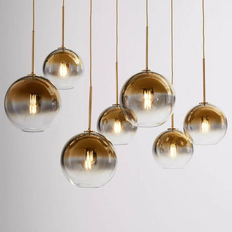Suspension luminaire boule en verre design moderne laiton