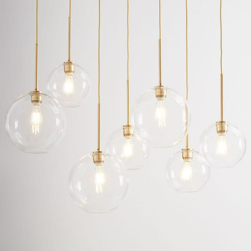 Suspension luminaire boule en verre design moderne laiton