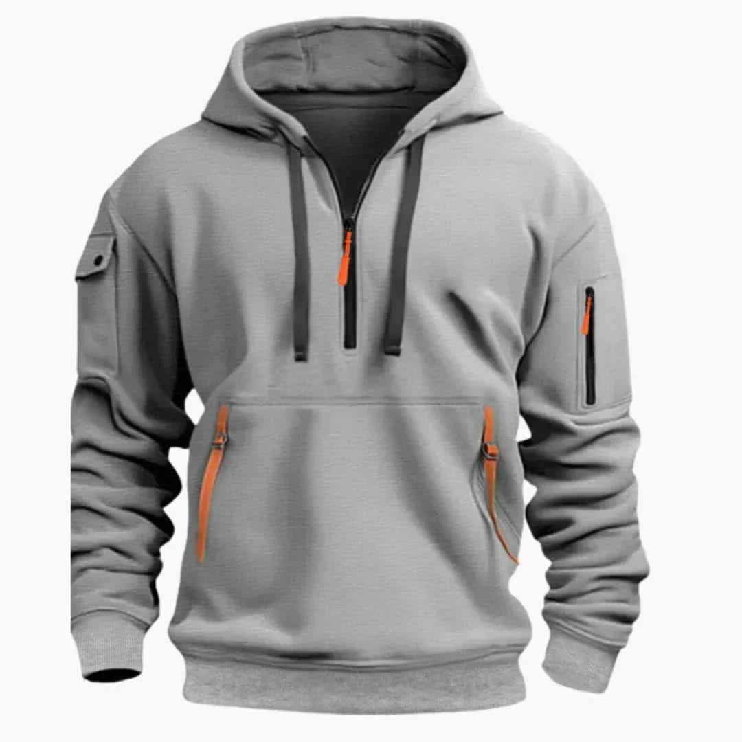 Sweat à capuche ajustable et poches zippées