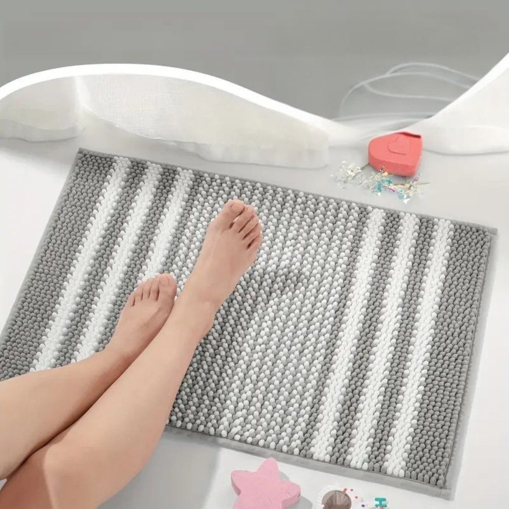 Tapis de bain rayé à motif de petites pierres