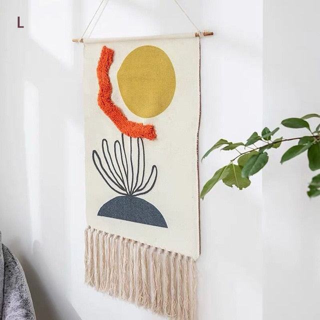 Tapisserie murale tissée à motifs géométriques et franges