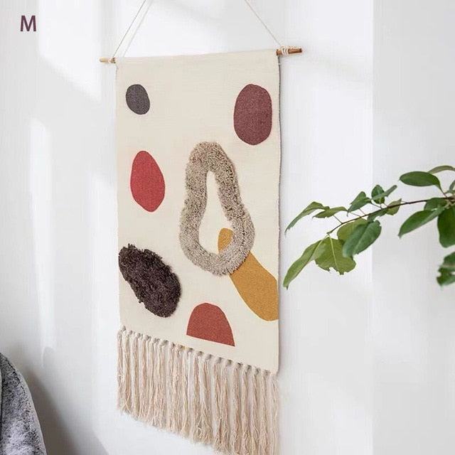 Tapisserie murale tissée à motifs géométriques et franges