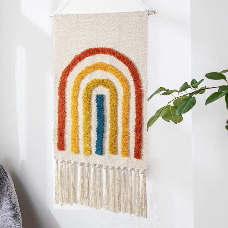Tapisserie murale tissée à motifs géométriques et franges