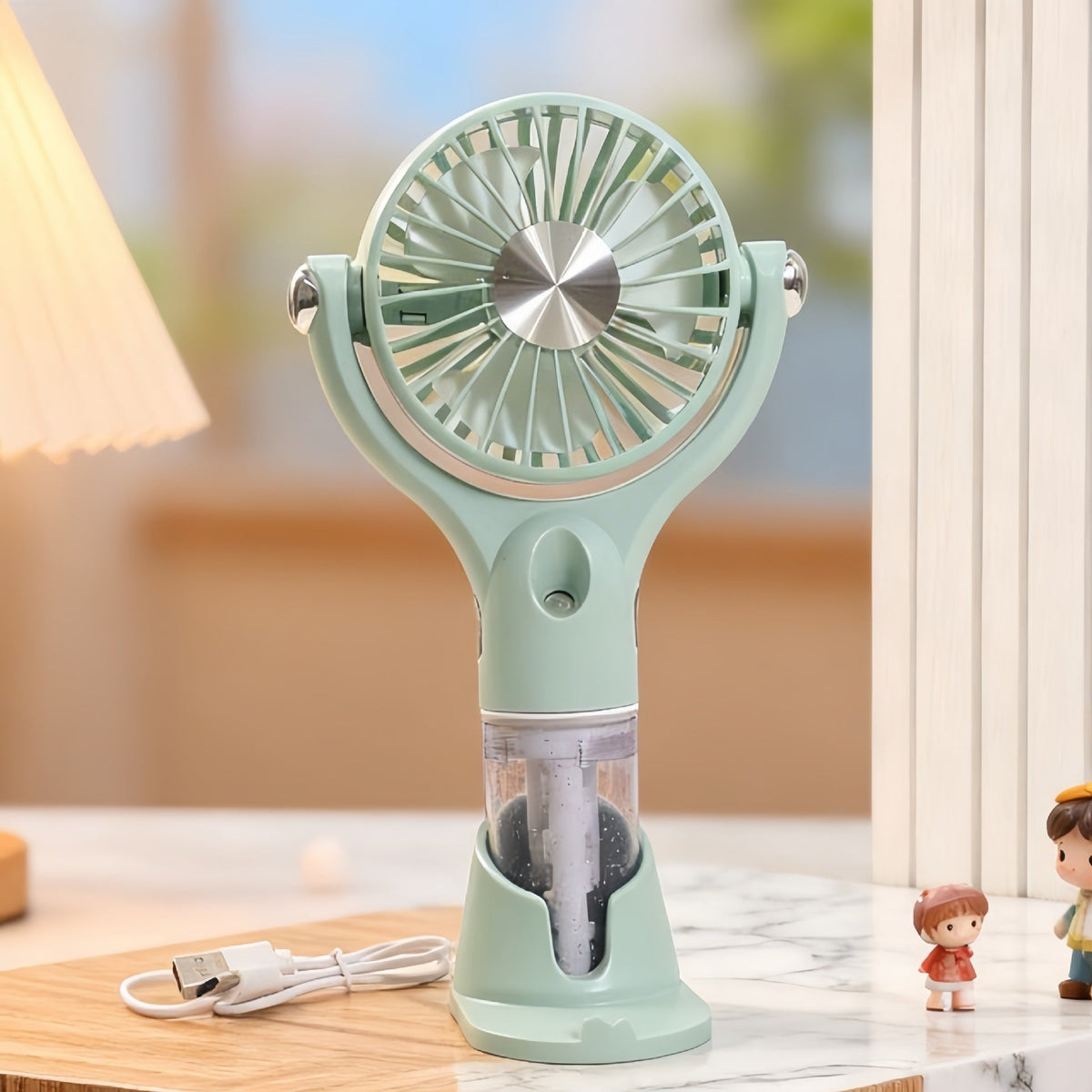 Ventilateur de main brumisateur portable et ergonomique avec rechargement USB unisexe