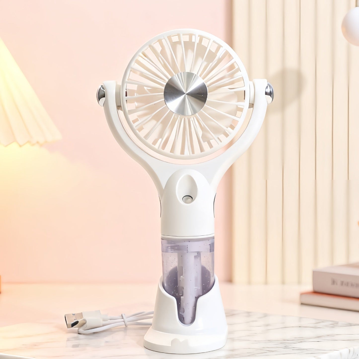 Ventilateur de main brumisateur portable et ergonomique avec rechargement USB unisexe