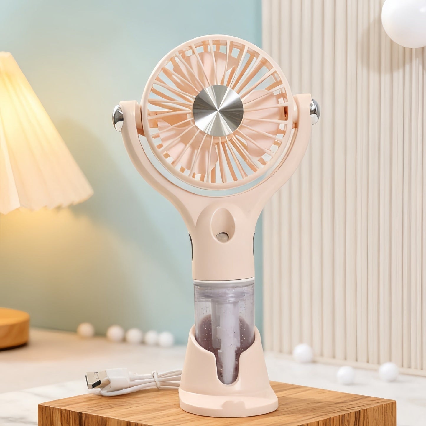 Ventilateur de main brumisateur portable et ergonomique avec rechargement USB unisexe