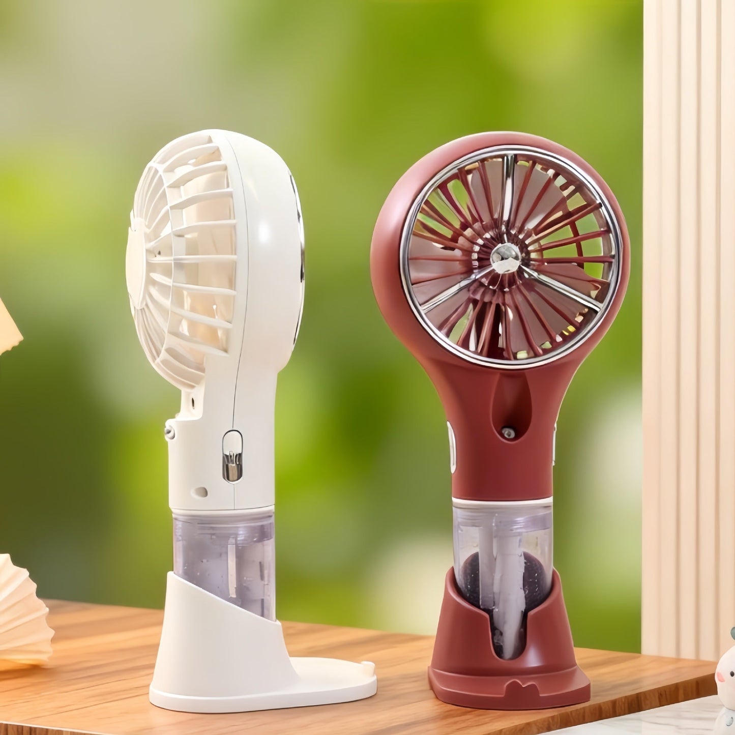 Ventilateur de main brumisateur portable et ergonomique avec rechargement USB unisexe
